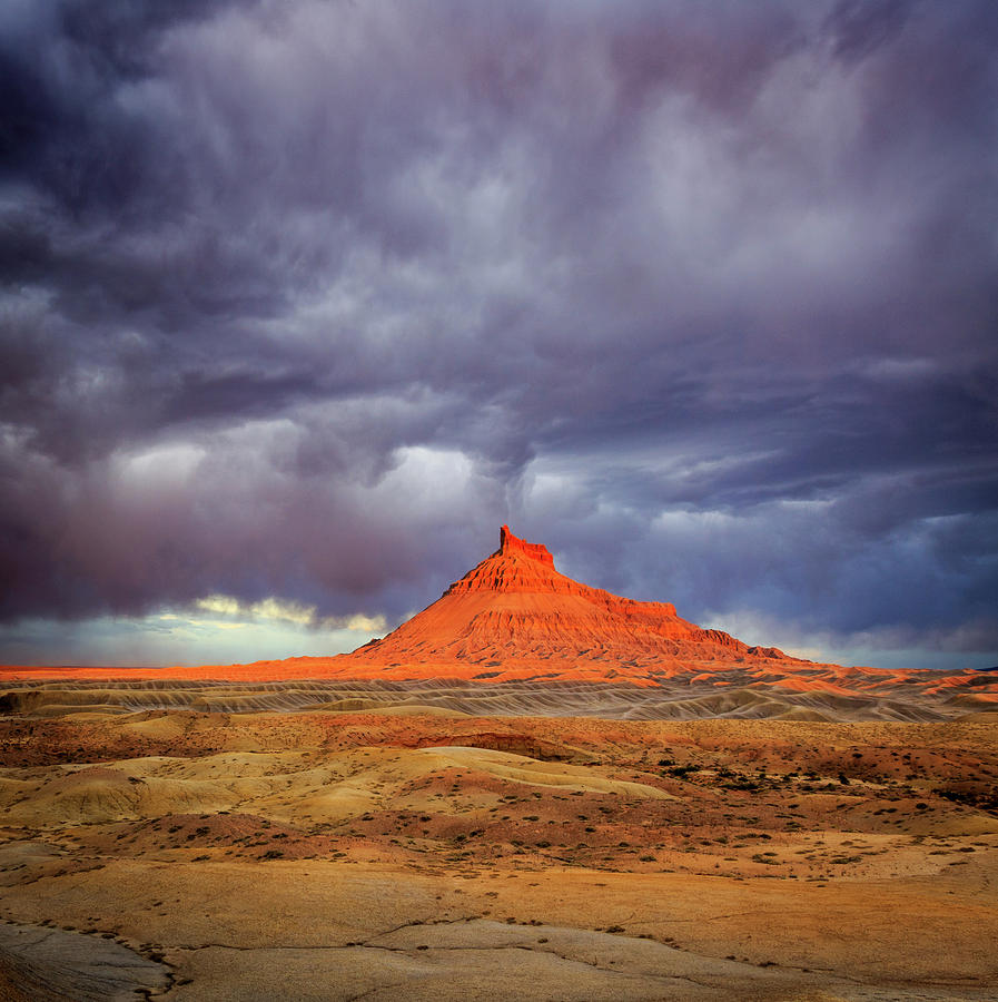 Spring Photograph - Stormy sunset above Factory Butte. by Wasatch Light