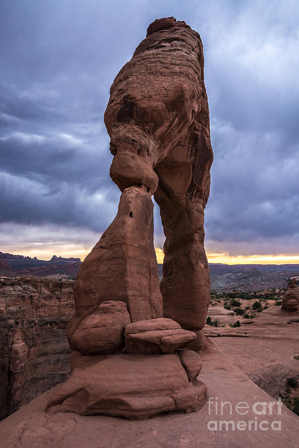 Stormy Sunset - Delicate Arch - Moab - Utah Photograph by Gary Whitton