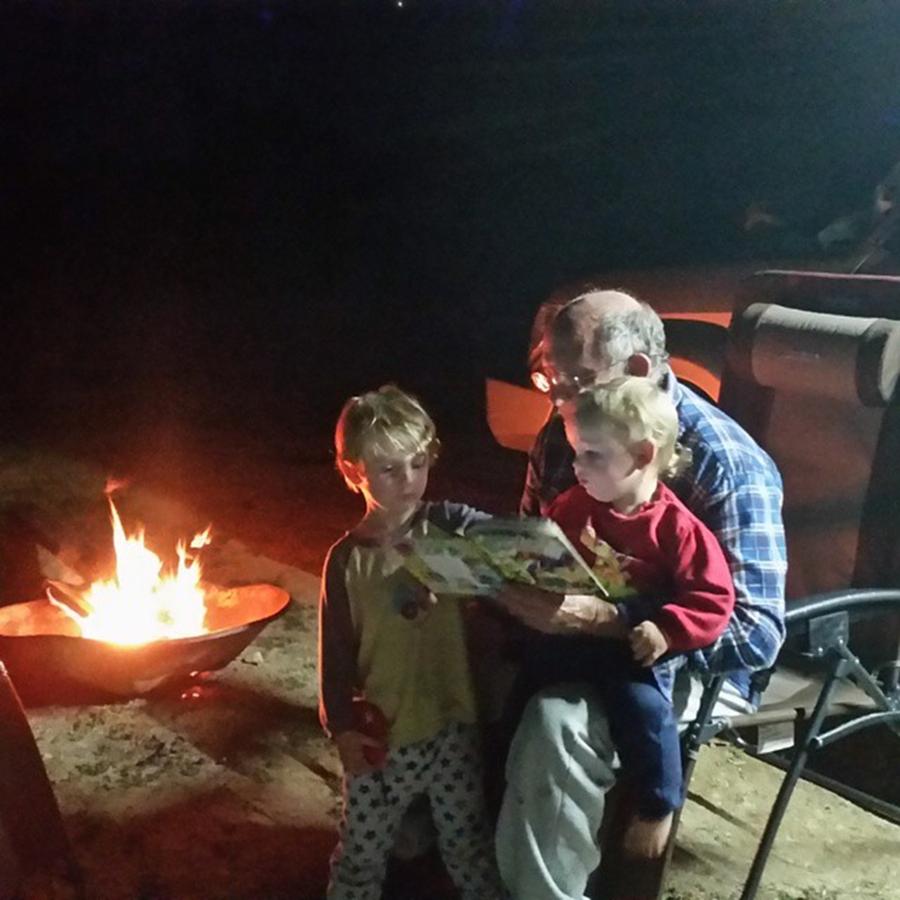 Holiday Photograph - Story Time With Poppy By The Camp Fire! by Mik Rowlands