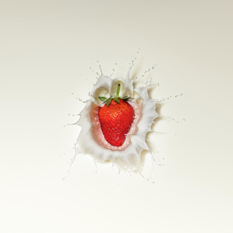 Strawberry splash in milk Photograph by Johan Swanepoel