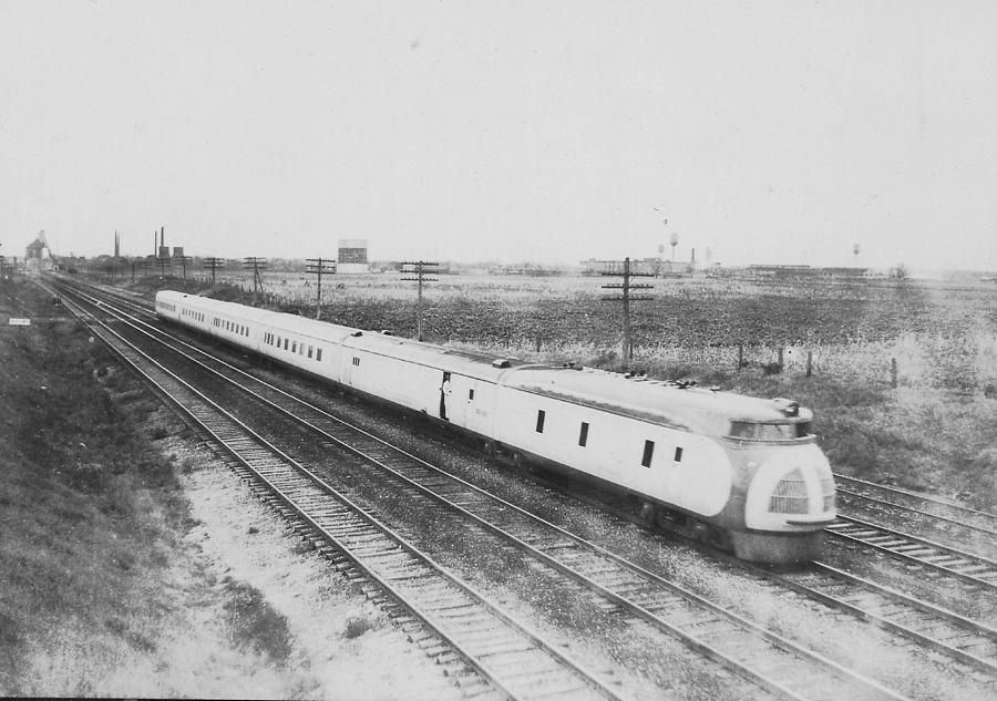 Streamlined Diesel Locomotive Carrying Passengers Photograph by Chicago and North Western Historical Society