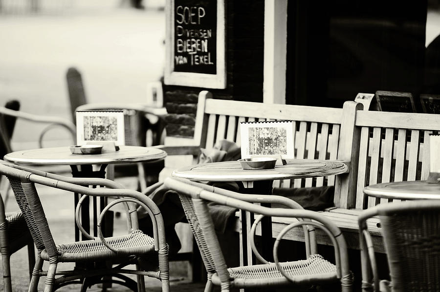 Street Cafe in Amsterdam. Black and White Photograph by Jenny Rainbow