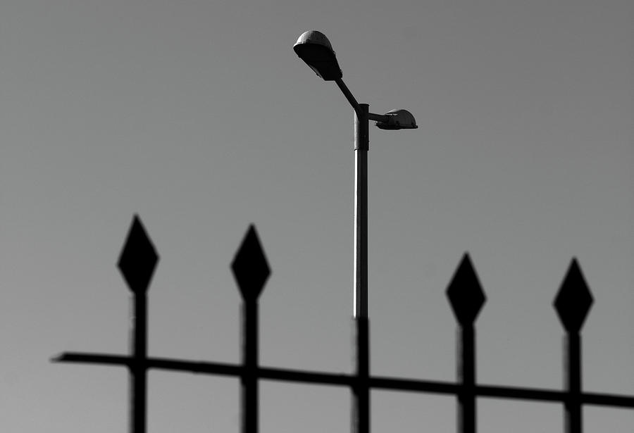 Street Lamp and Iron Metal Fence Photograph by Prakash Ghai