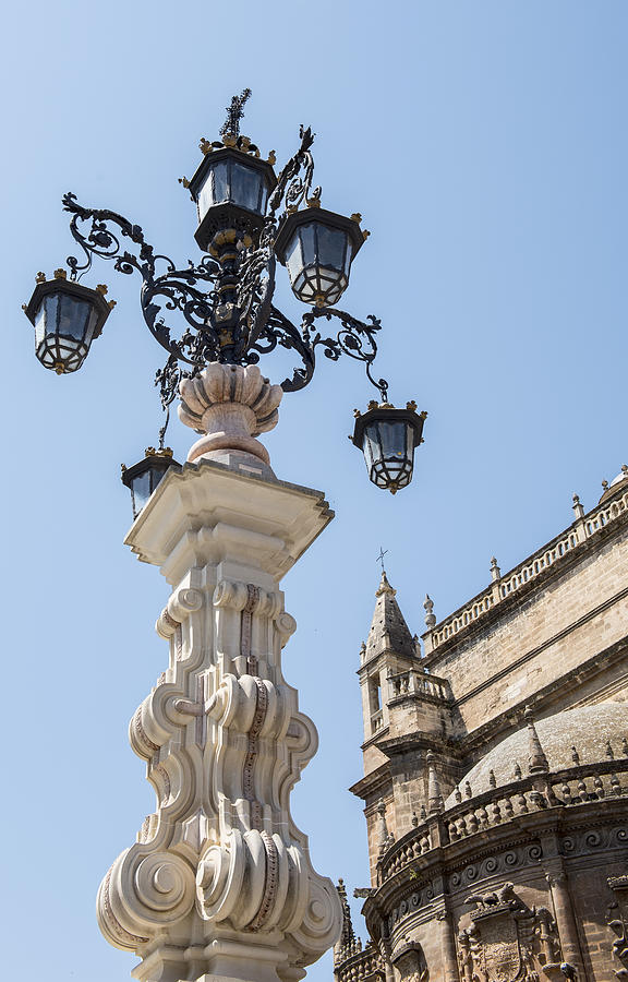 Cathedral Of Seville Photograph - Street Lamp - Cathedral of Seville - Seville Spain by Jon Berghoff