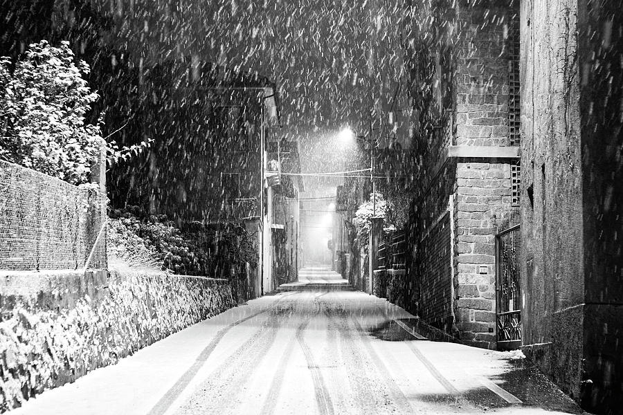 Street Of Snowfall At Night Photograph