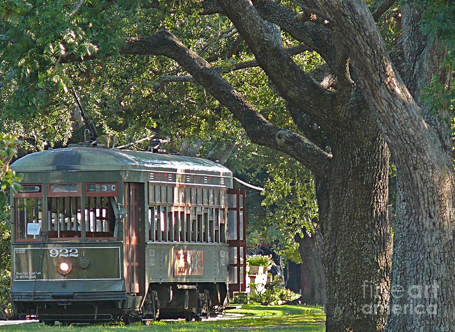 Streetcar Under the Oak Trees Photograph by Jeanne  Woods