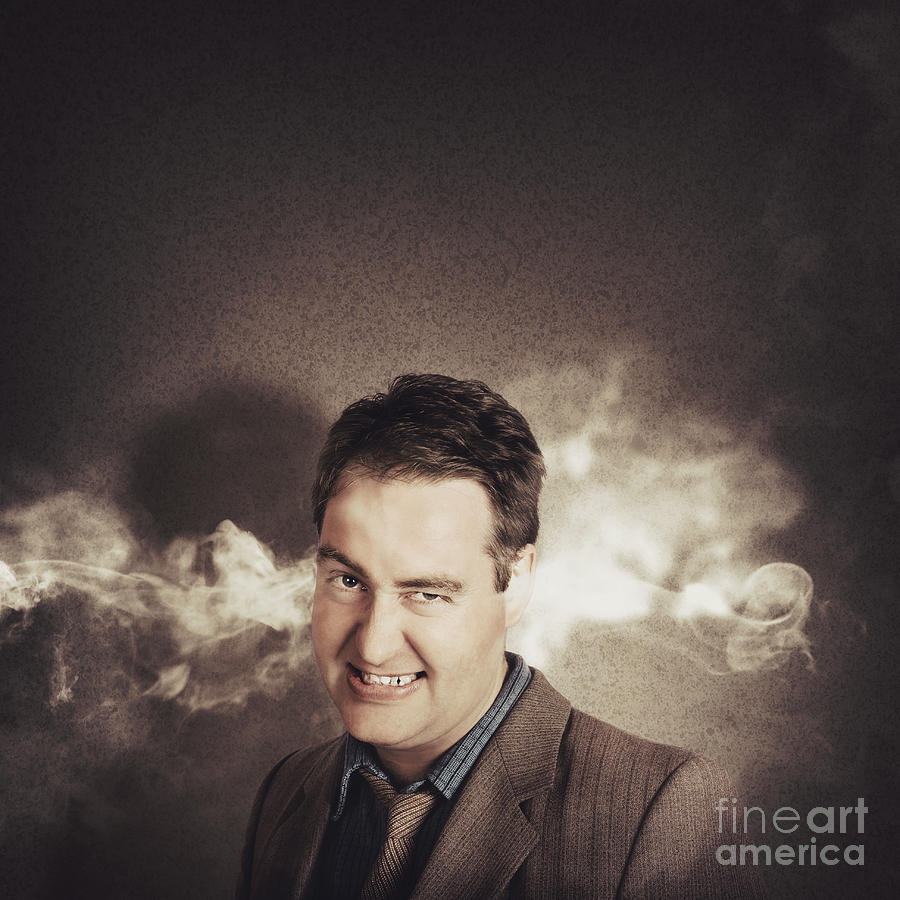 Stressed businessman with steaming hot headache Photograph by Jorgo Photography