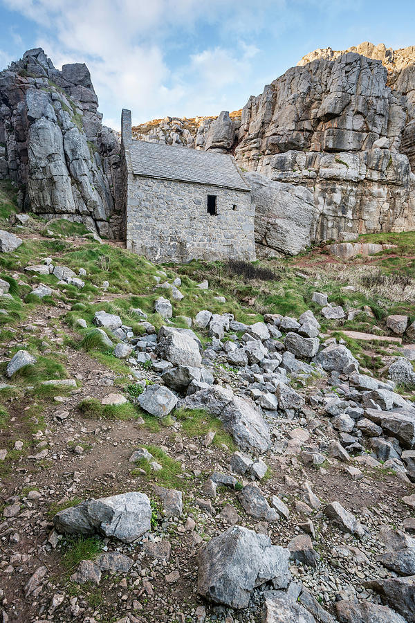 Stunning landscape image of St Govan's Chapel on Pemnrokeshire C ...