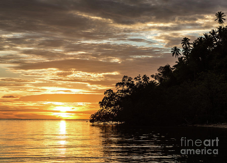 Stunning sunset in the Togian islands in Sulawesi Photograph by Didier Marti