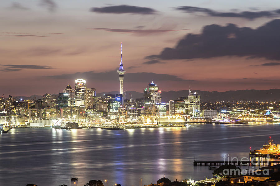 Stunning sunset over Auckland central business district Photograph by Didier Marti