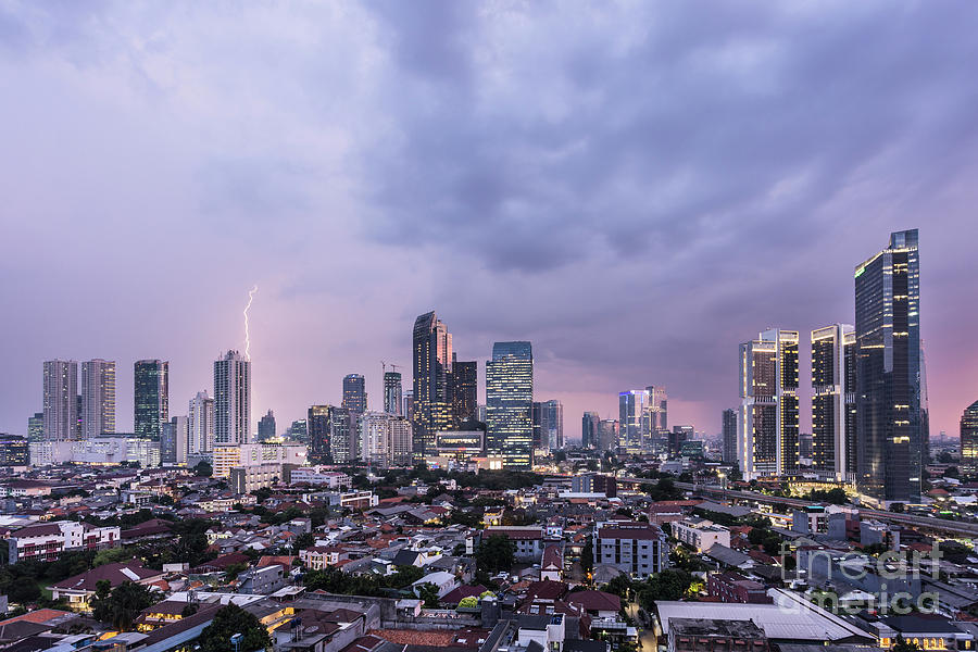 Stunning sunset over Jakarta, Indonesia capital city Photograph by Didier Marti