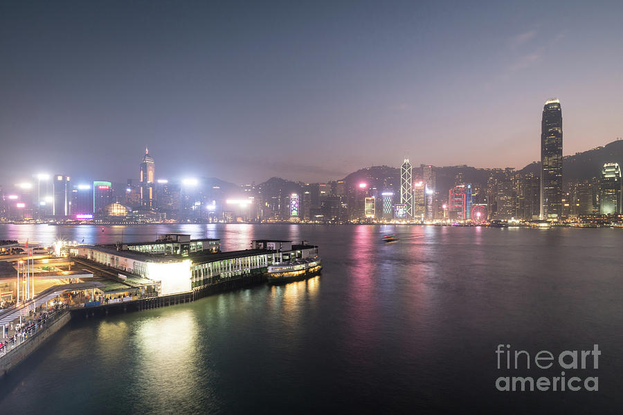 Stunning view of the twilight over the Victoria harbor and star  Photograph by Didier Marti