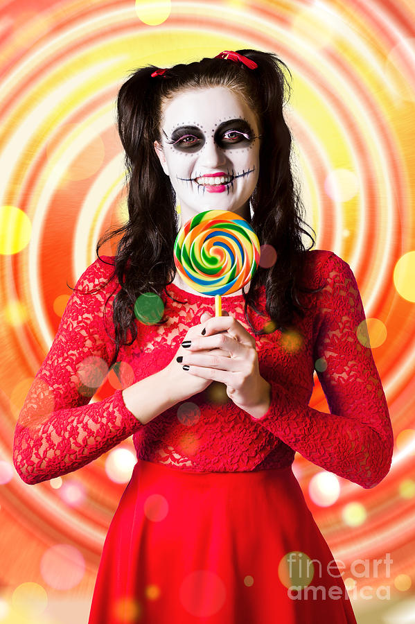 Sugar skull girl holding colourful lollypop candy Photograph by Jorgo Photography