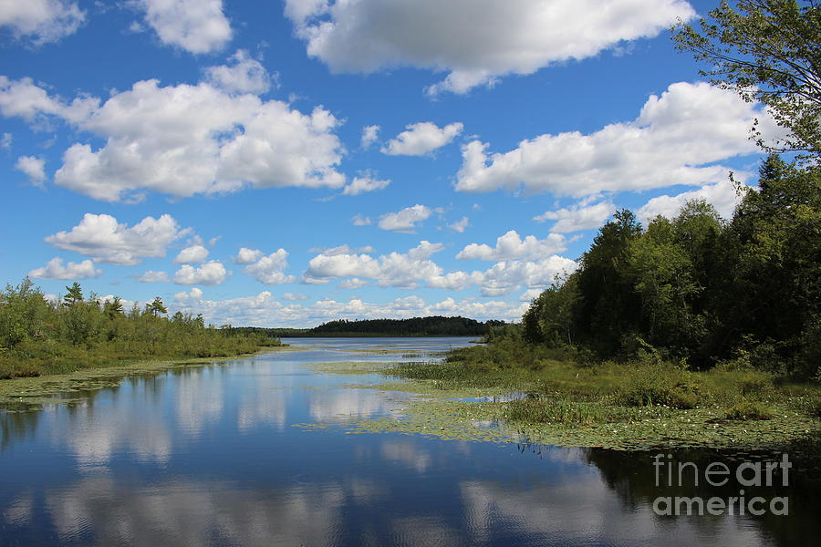 Summer cloud reflections on Little Indian Pond in Saint Albans Maine ...