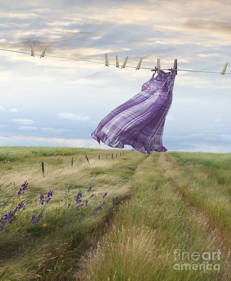 Summer dress blowing on clothesline with girl walking down path Photograph by Sandra Cunningham