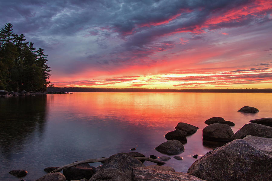 Summer sets over Sebago Lake, Maine Photograph by Colin Chase