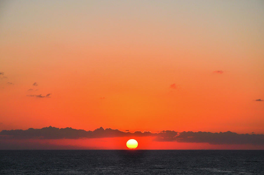 Sun Balancing on the Horizon Photograph by Joel Thai