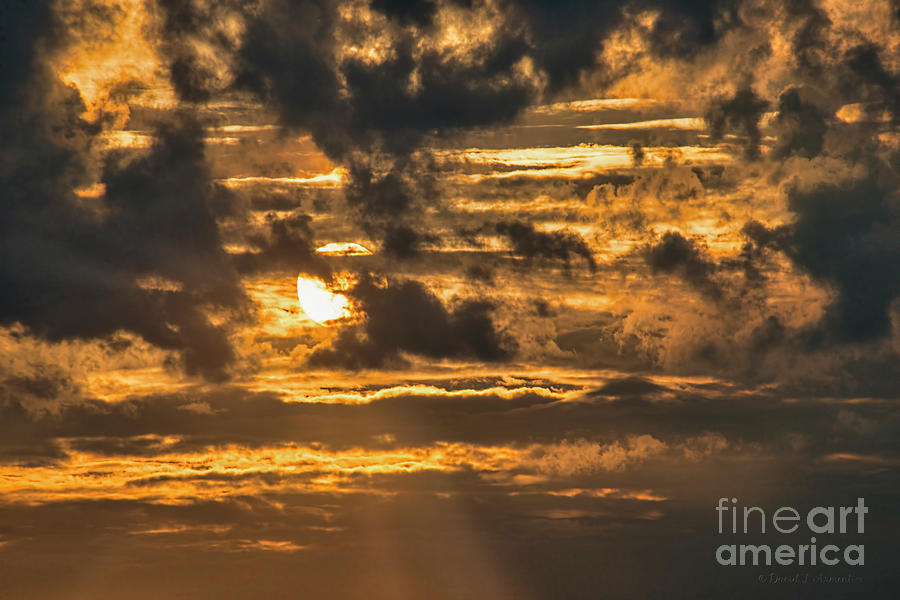 Sun behind Clouds Photograph by David Arment