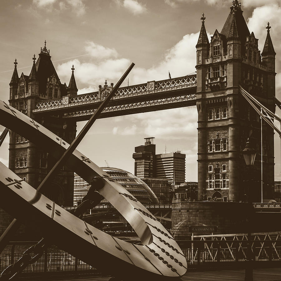 Architecture Photograph - Sun Clock with Bridge Tower London in Sepia Tone by Jacek Wojnarowski