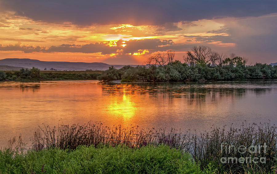 Sun Glow On The Snake River Photograph by Robert Bales