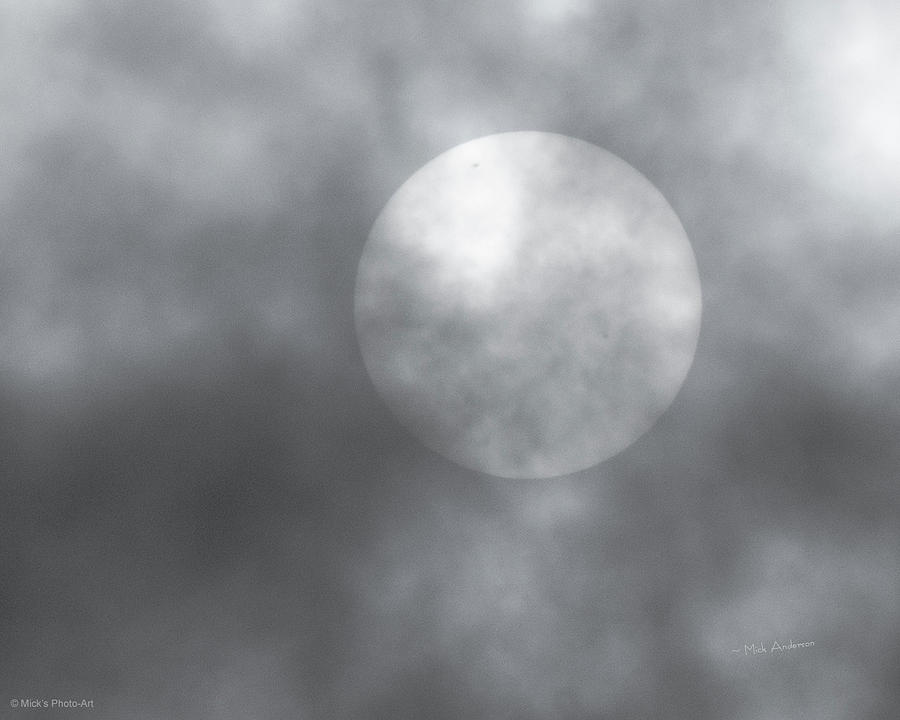 Sun In The Clouds with Sunspot Photograph by Mick Anderson