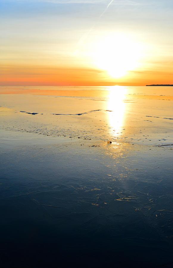 Sun On The Ice  Photograph by Lyle Crump
