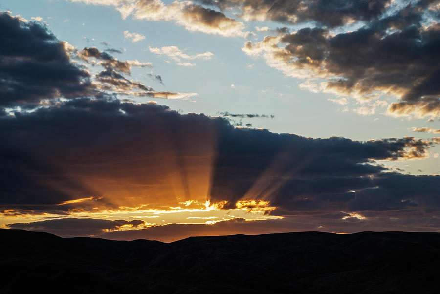 Sun rays over Boise hills Photograph by Vishwanath Bhat