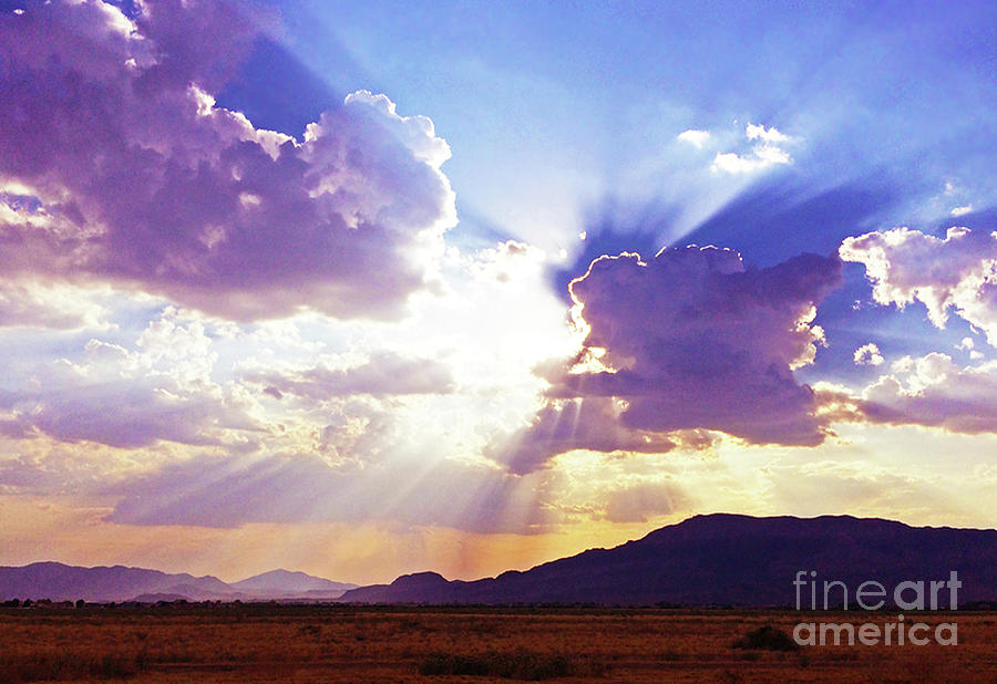 Sun Rays Over The Desert Photograph by J Marielle