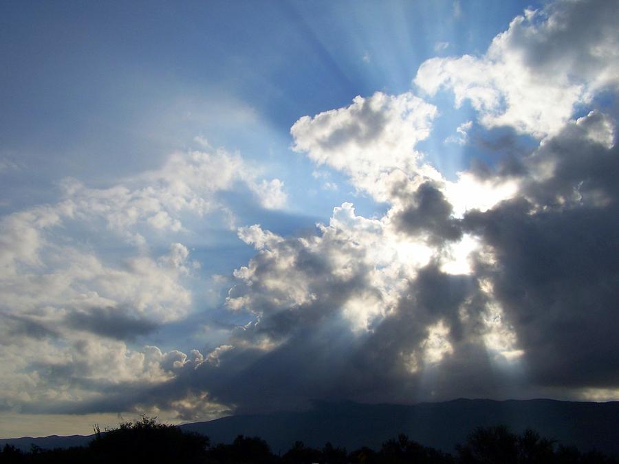 Sun Rays Thru The Clouds Photograph