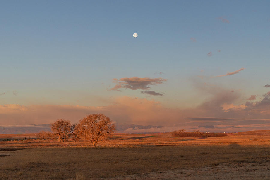 Sun Rises, Moon Sets Photograph by Tony Hake