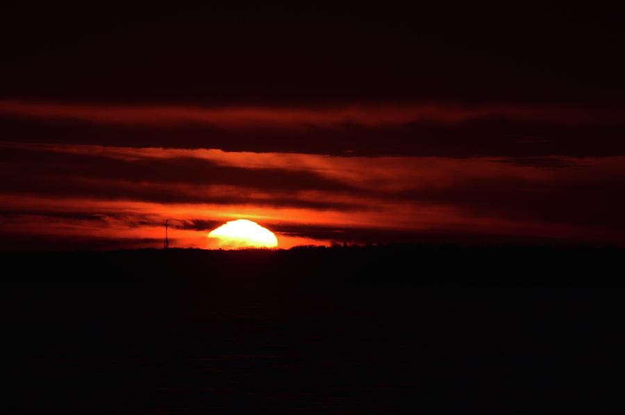 Sun Rising Above The Horizon  Photograph by Lyle Crump