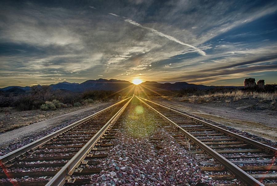 Sun sets at the end of the line Photograph by Gaelyn Olmsted
