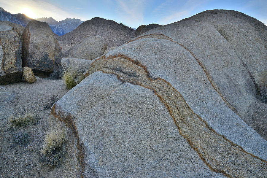 Sun Sets Behind Sierra Nevada Mountains in the Alabama Hills Photograph by Ray Mathis
