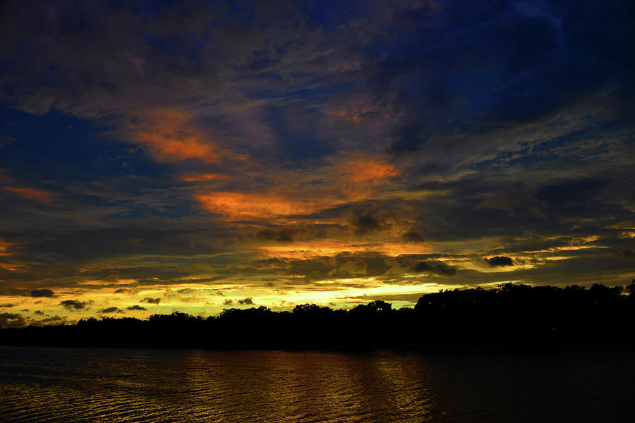Sun setting over Florida Photograph by David Lee Thompson