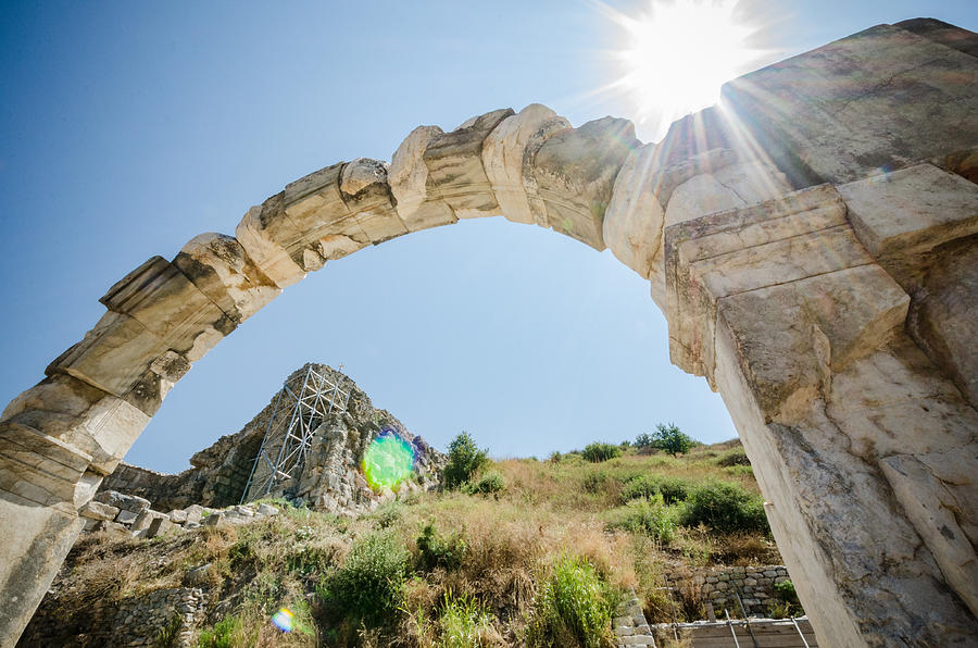 Sun Shining on an Ephesus Arch Photograph by Anthony Doudt