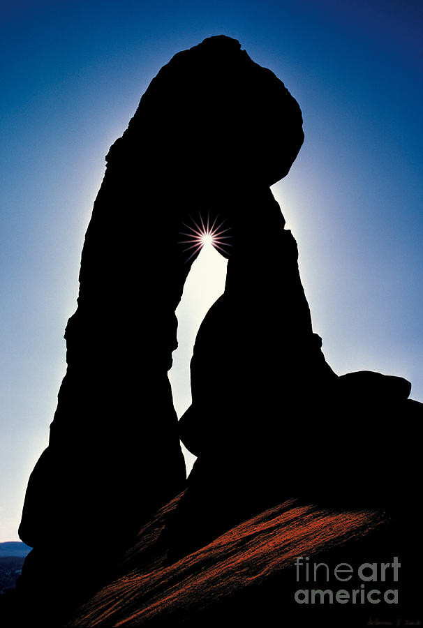 Arches National Park Photograph - Sun through Delicate Arch by Warren Sarle