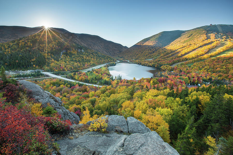 Fall Photograph - Sunburst over Franconia Notch by White Mountain Images