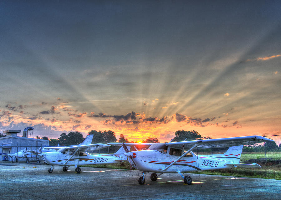 Cessna 172 Photograph - Sunburst Over the Ramp by Philip Rispin