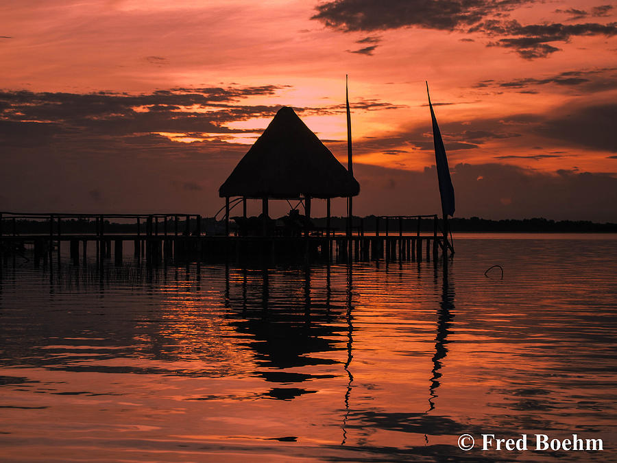 sundown in Bacalar Mexico Photograph by Fred  Boehm