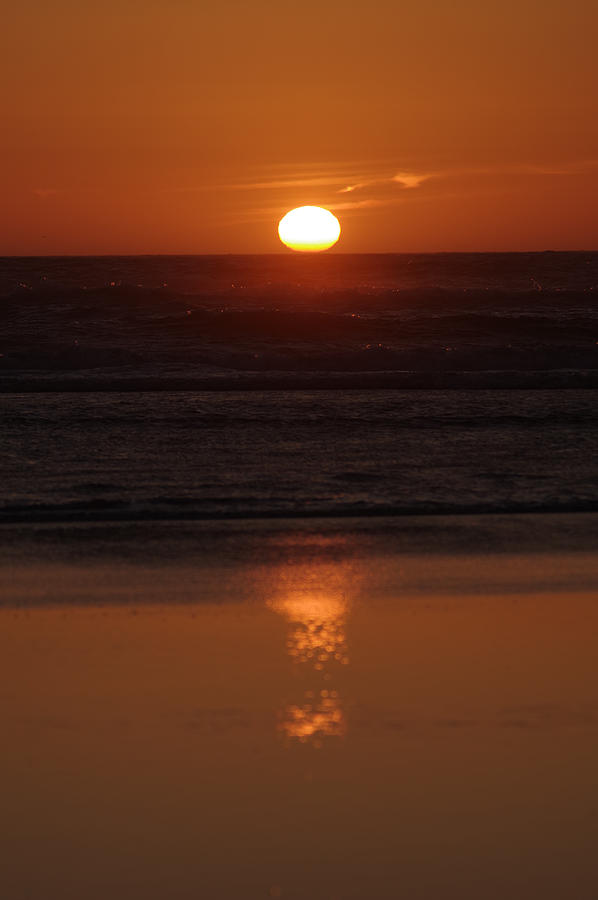 Sundown on the ocean Photograph by Jeff Swan