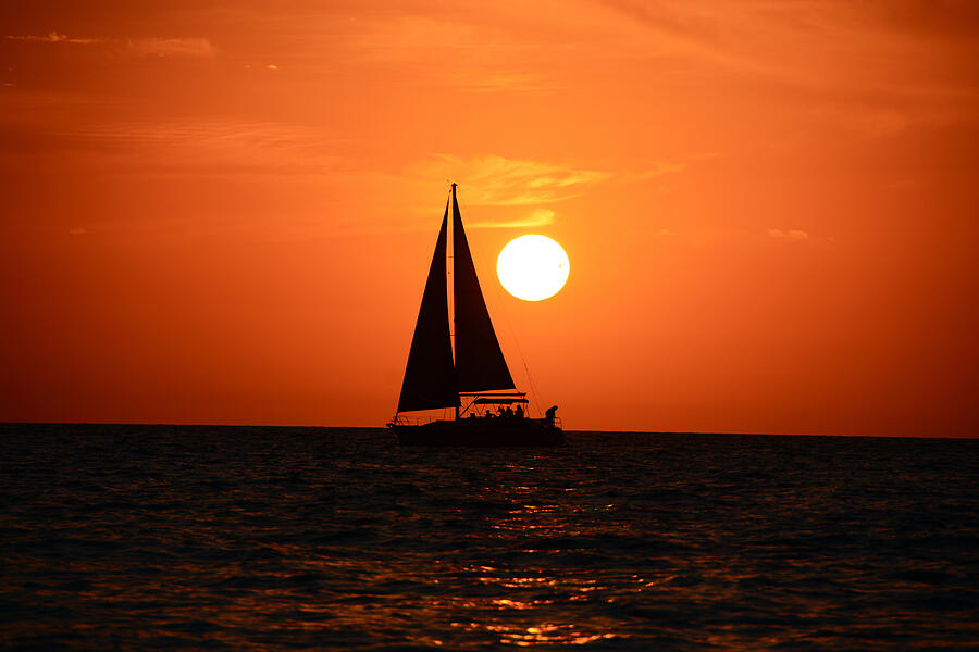 Sundown Sailors - Clearwater Beach, Florida Photograph by Ben Prepelka
