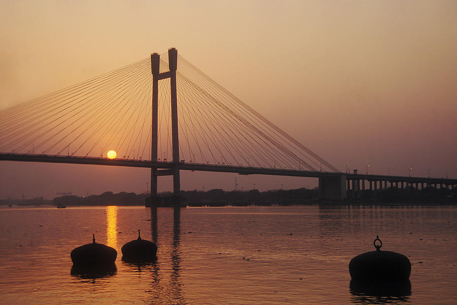 Bridge Photograph - Sundowner by Subhankar Bhaduri