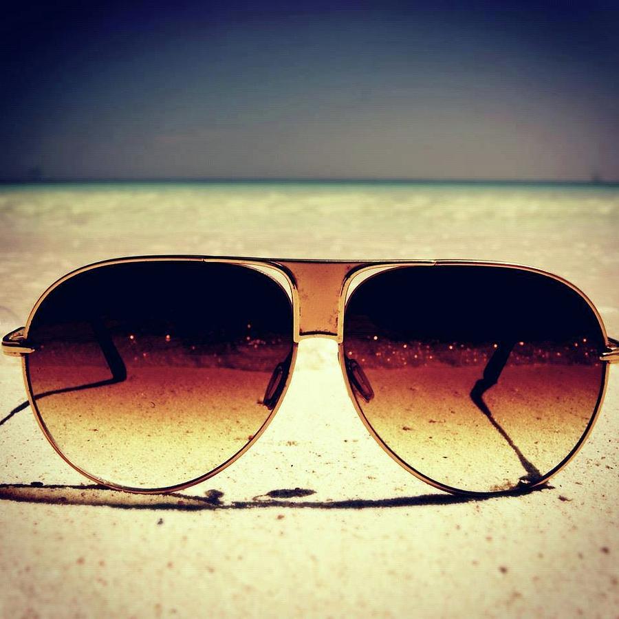Sunglasses On Beach Photograph by Smita Shitole - Pixels