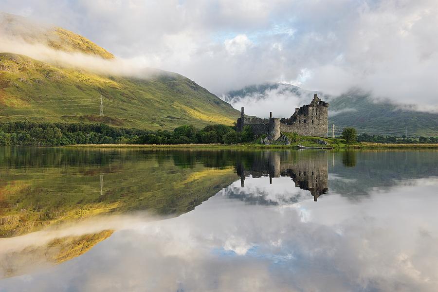 Sunlight and clouds at Kilchurn Photograph by Stephen Taylor