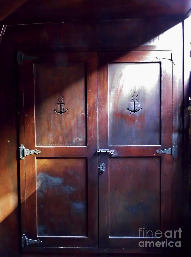 Sunlight On The Gun Deck Doors Photograph by D Hackett