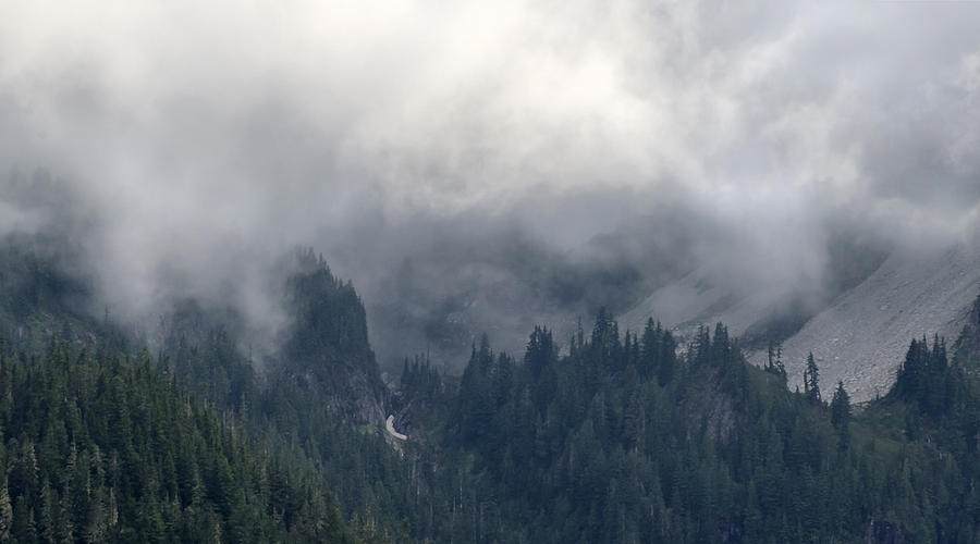 Sunlit Clouds on Mt. Rainier Photograph by Lynn Hansen