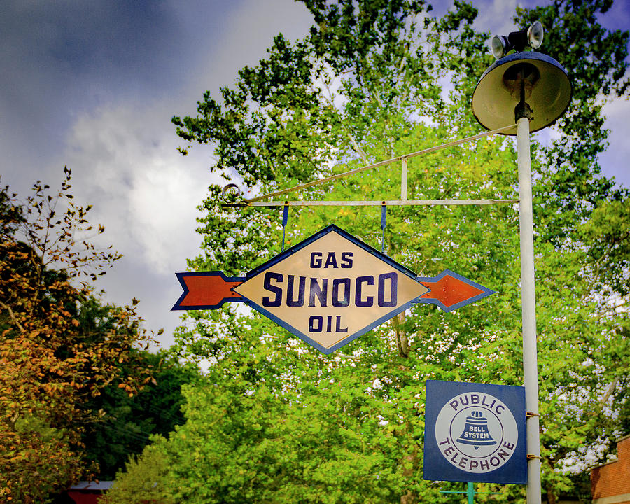 Sunoco Sign on Pole with Public telephone Photograph by Jack R Perry