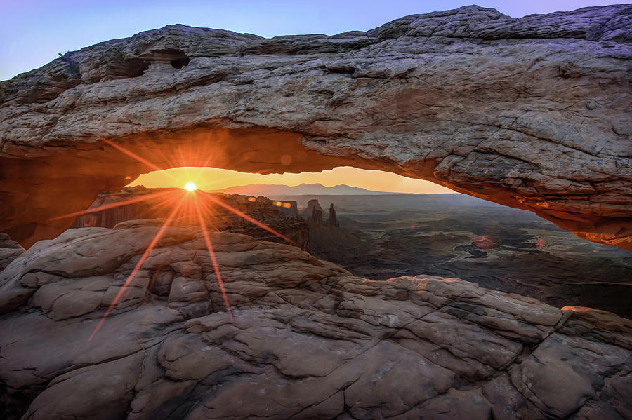 Nature Photograph - Sunrays over Canyonland National Park at the Mesa Arch by Gregory Ballos