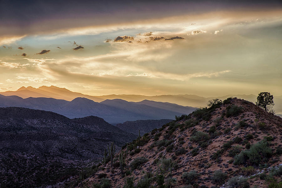 Sunrays over Four Peaks at Sunset in central Arizona Photograph by Dave Dilli