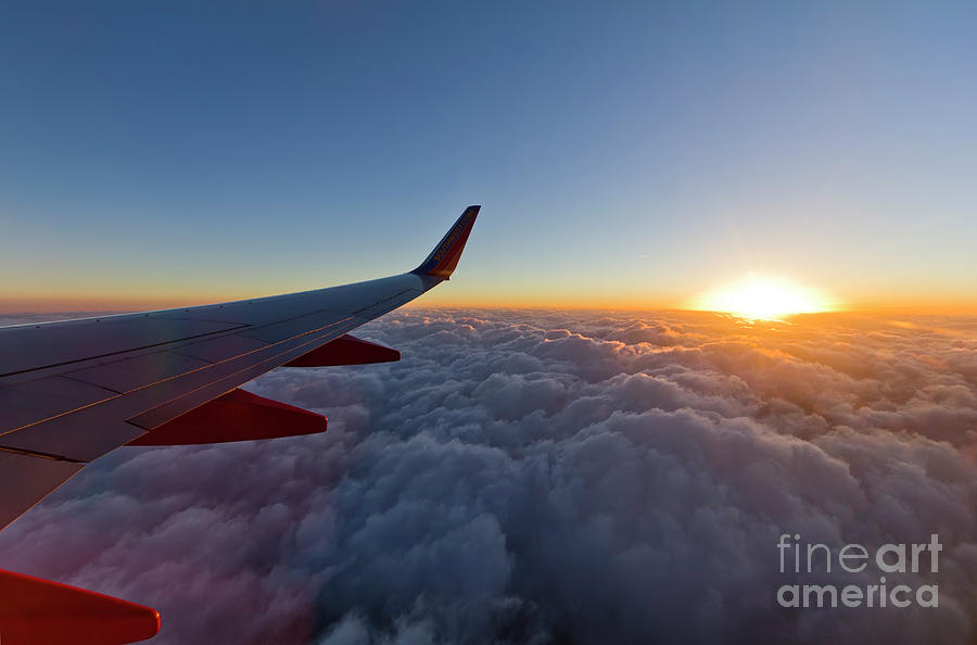 Sunset Photograph - Sunrise Above the Clouds on Southwest Airlines by Dustin K Ryan